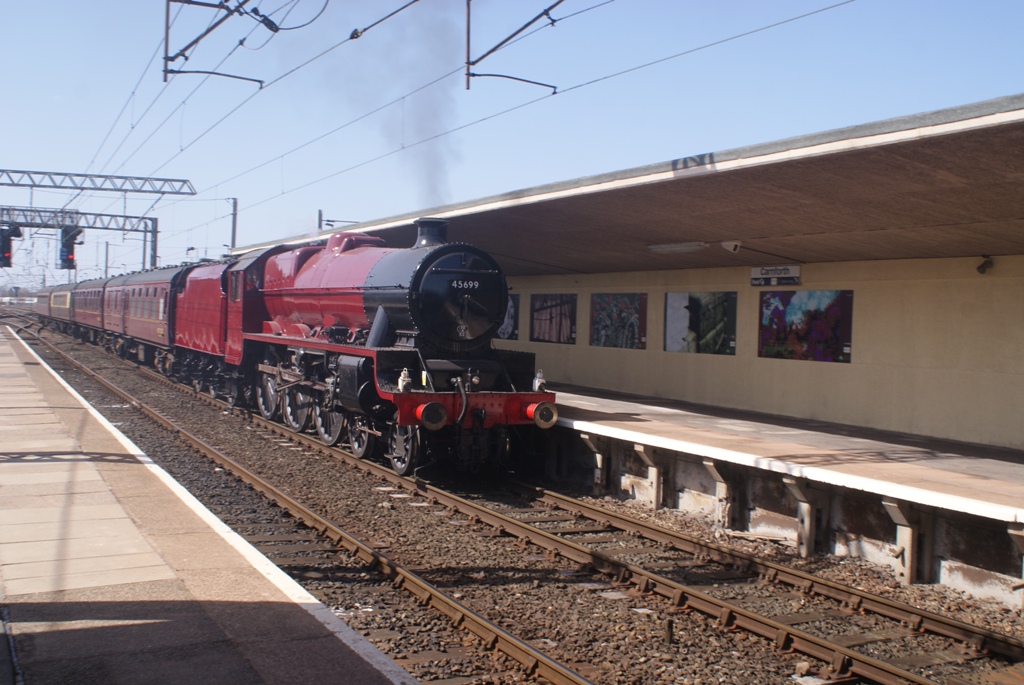 45699 Galatea running through Carnforth with a test train of four coaches, 16 April 2013